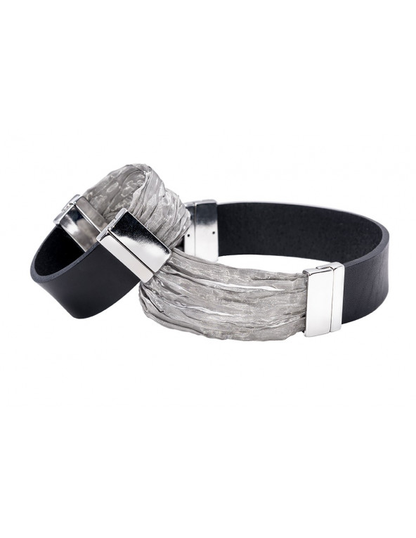 Black women's leather bracelet with stainless steel mesh and a shiny magnetic clasp