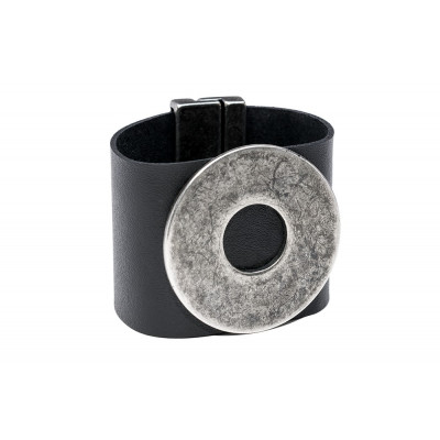 Wide black leather bracelet with matte steel circle and bold minimalist design