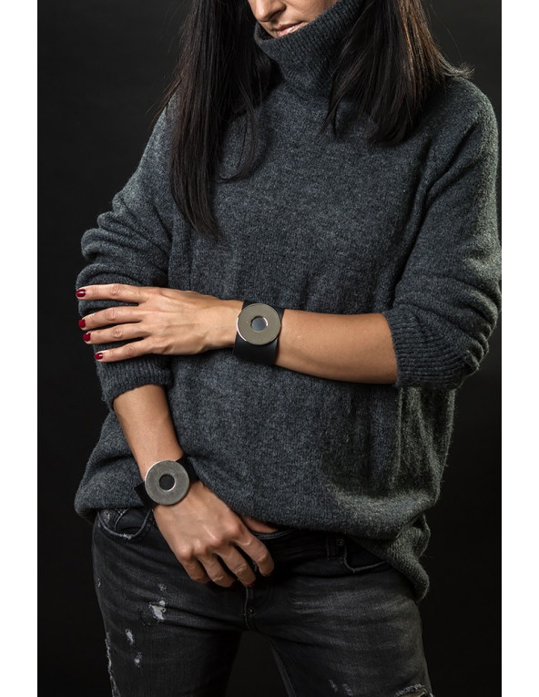 Wide black leather bracelet with polished stainless steel element