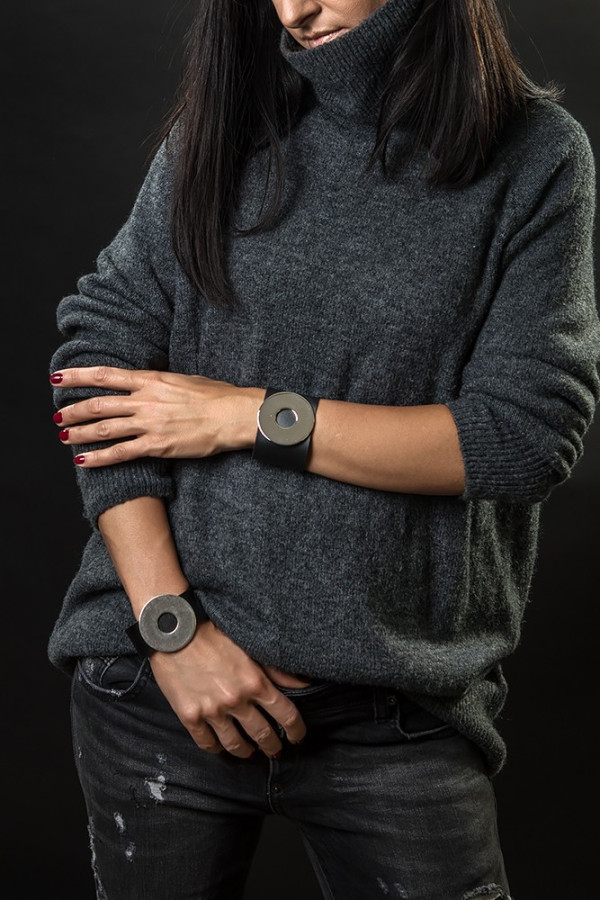 Wide black leather bracelet with matte steel circle and bold minimalist design 2