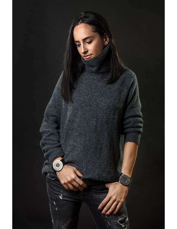 Wide black leather bracelet with matte steel circle and bold minimalist design