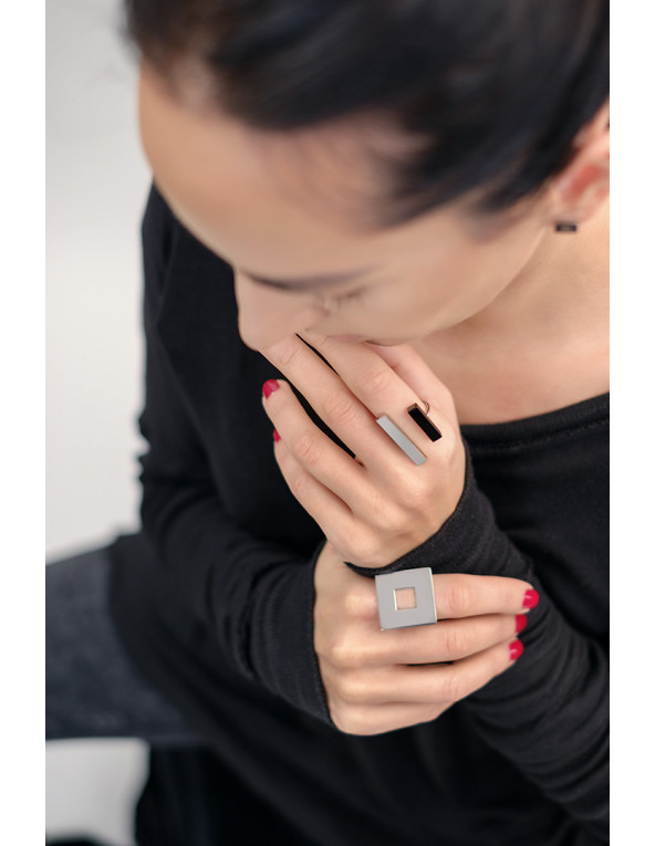 Adjustable stainless steel ring in silver and black with geometric rectangle design