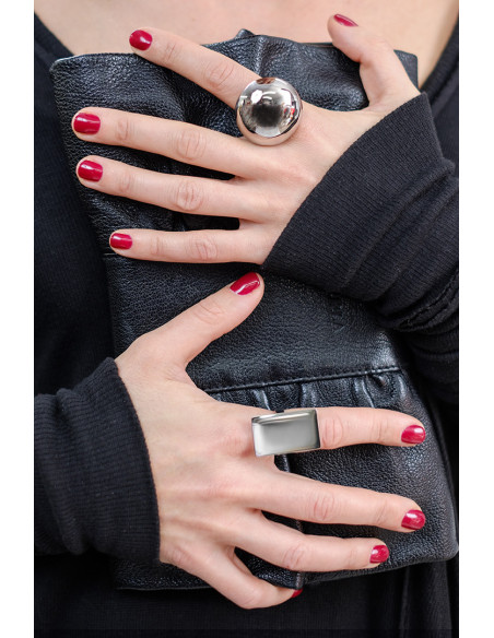 Minimalist stainless steel ring in a geometric half-sphere design with polished silver finish