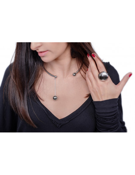 Stainless steel choker with decorative sphere in minimalist style