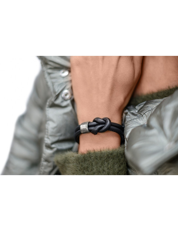 Black leather bracelet with matte stainless steel elements.