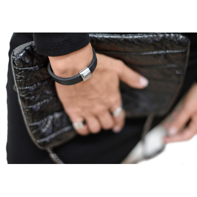 Black leather bracelet with a shiny stainless steel accent. 2