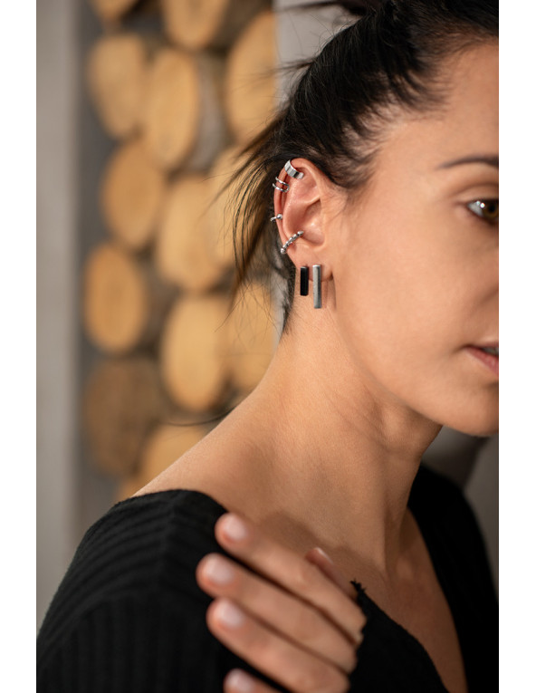 Black shiny stainless steel rectangular earrings with a minimalist and elegant design.