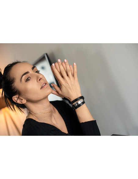 Triple-wrap women’s black leather bracelet with silver stainless steel detail and black clasp.