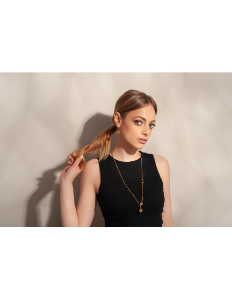 Gold-plated silver and stainless steel ball earrings in golden shade