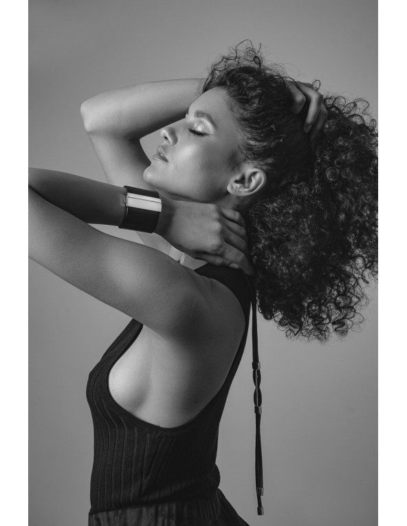 Wide black leather bracelet with glossy stainless steel clasp