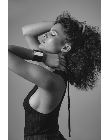 Wide black leather bracelet with glossy stainless steel clasp