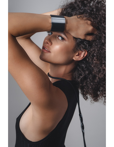 Wide black leather bracelet with glossy stainless steel clasp