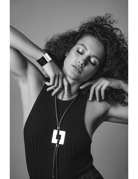 Black classic women's leather bracelet with a shiny steel clasp