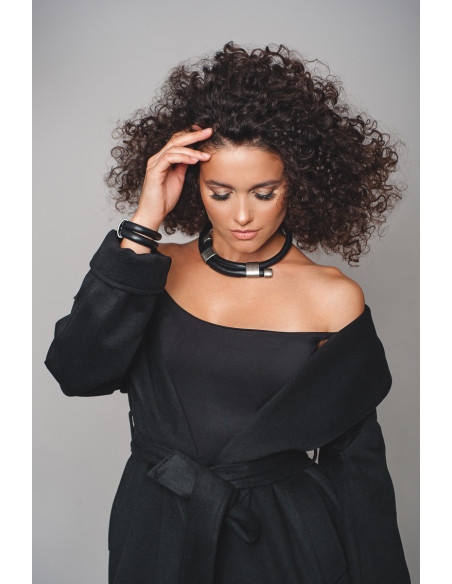 Adjustable black leather choker with shiny stainless steel element