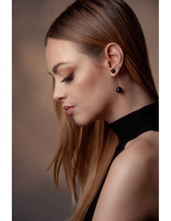Matte black stainless steel earrings with two decorative spheres