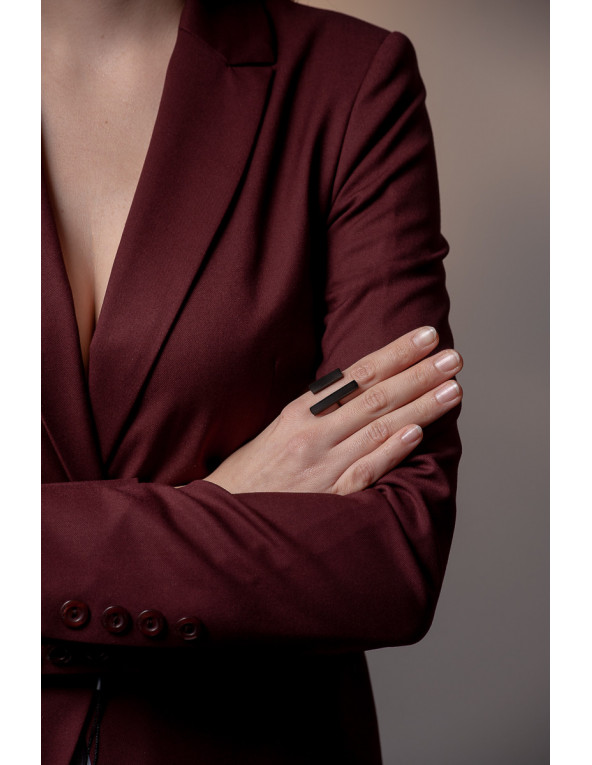 Adjustable ring made of black matte stainless steel.