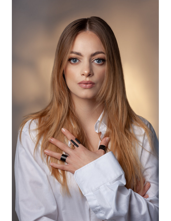 Modern ring in glossy black stainless steel