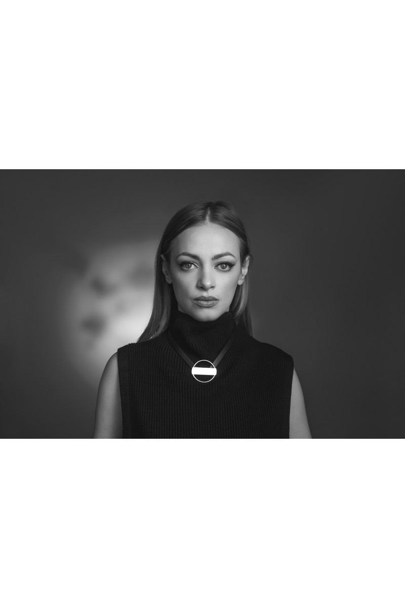 Leather necklace with aged steel circle element