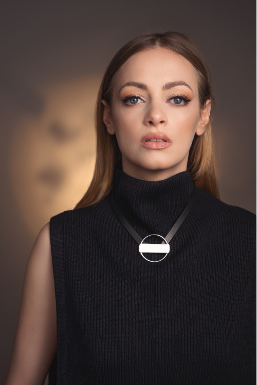 Leather necklace with aged steel circle element