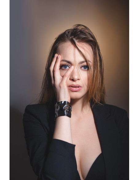 Wide crumpled stainless steel bracelet with a polished finish