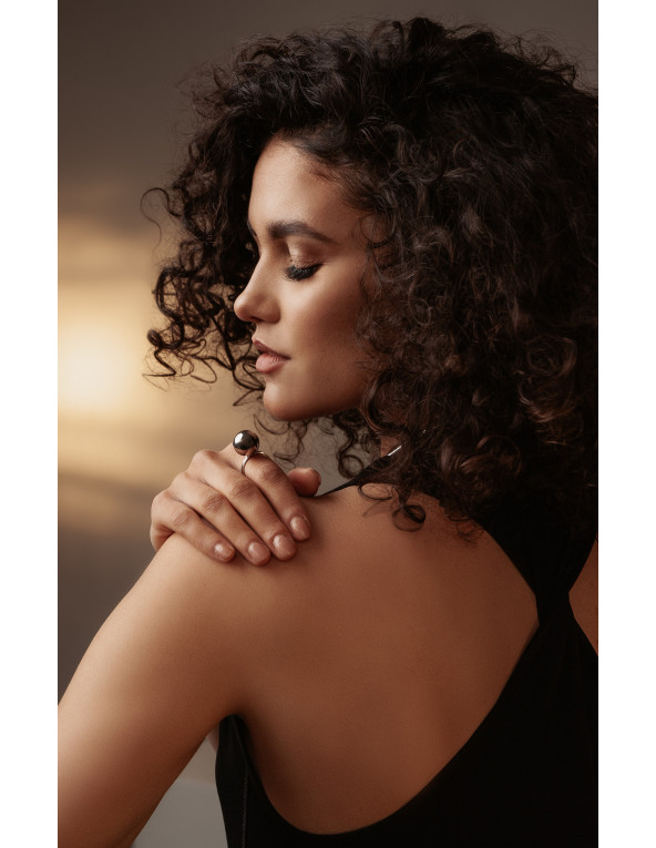 Stainless steel ring with large silver sphere