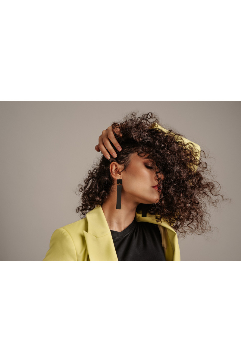 Long minimalist earrings made of black matte stainless steel