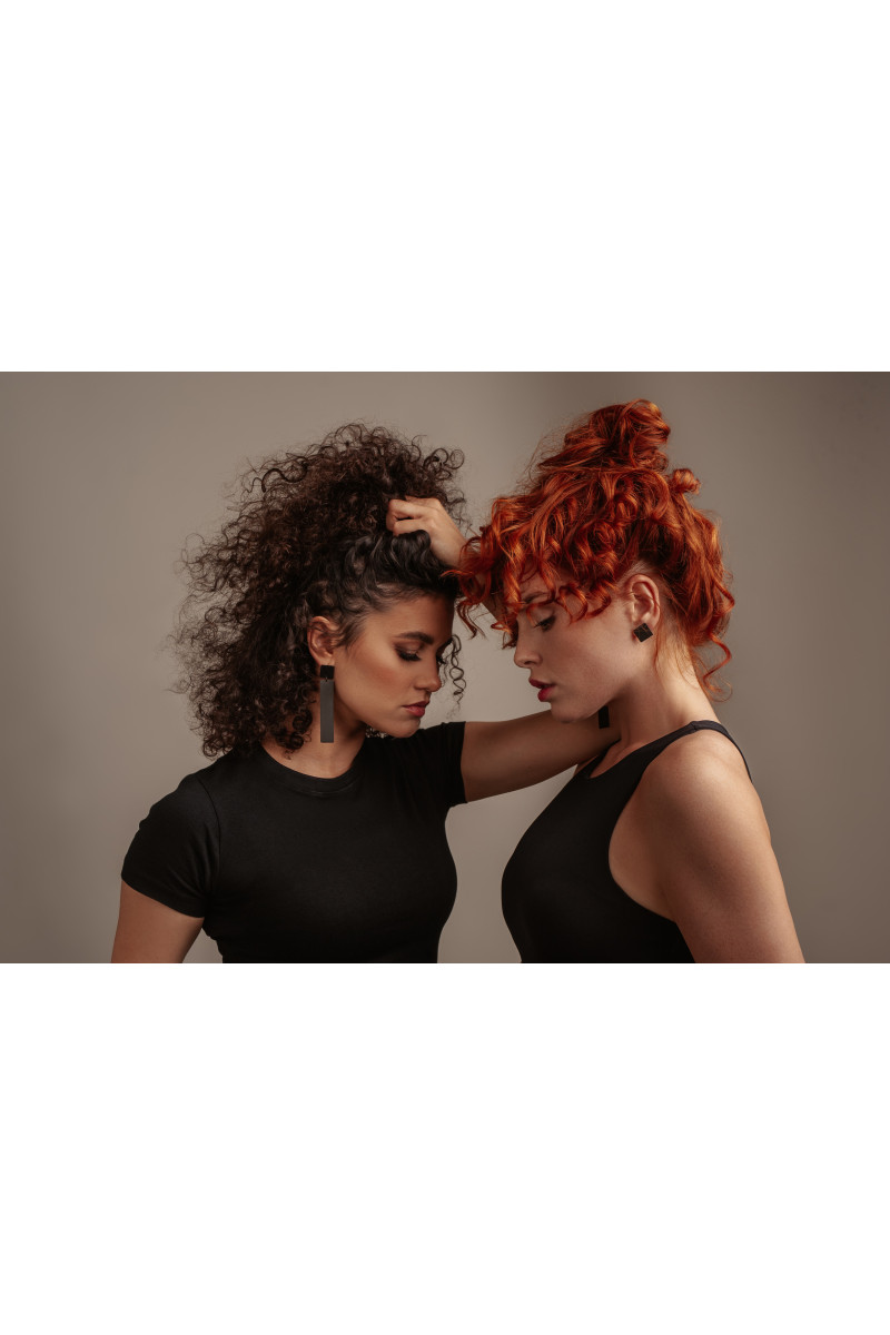 Long minimalist earrings made of black matte stainless steel