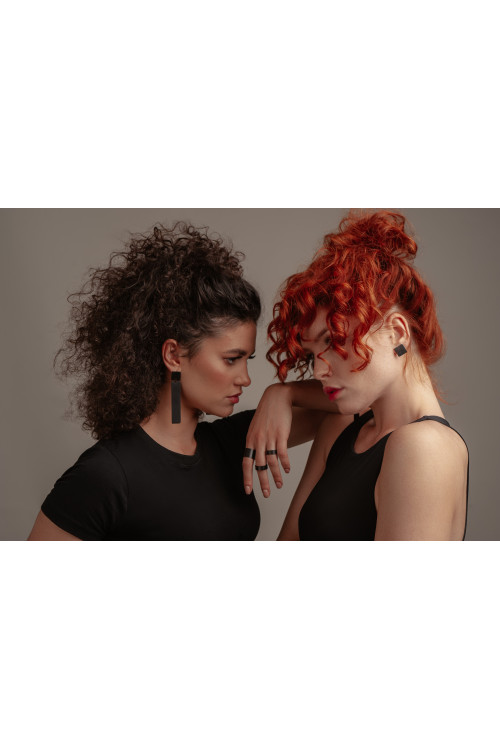 Long minimalist earrings made of black matte stainless steel