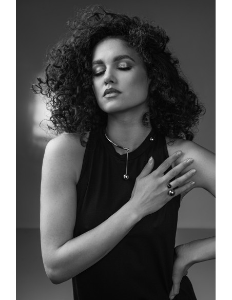 Stainless steel choker with decorative sphere in minimalist style