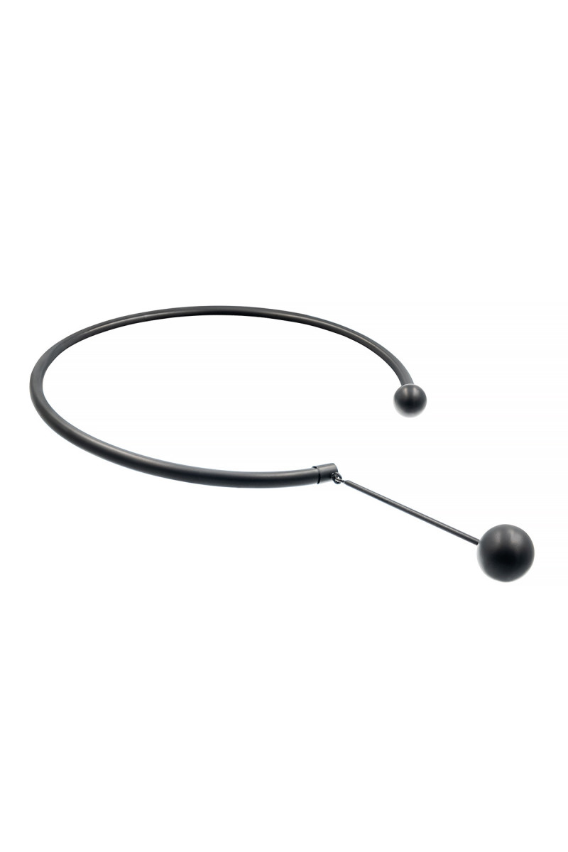 Black matte stainless steel necklace with decorative sphere.