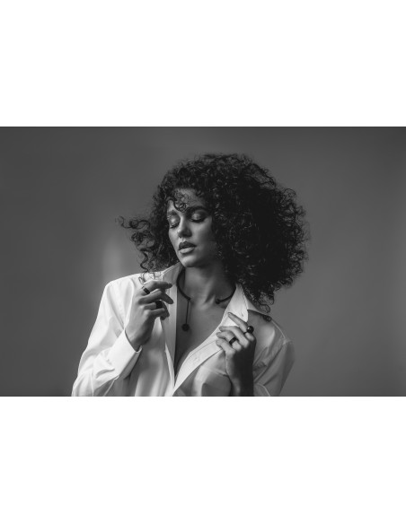 Black matte stainless steel necklace with decorative sphere.