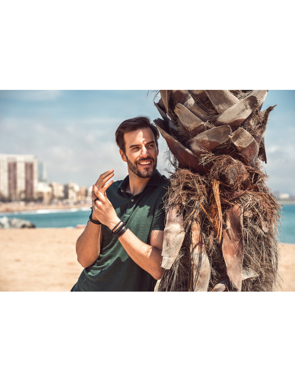 Set of three men's bracelets made of black leather and lava stones