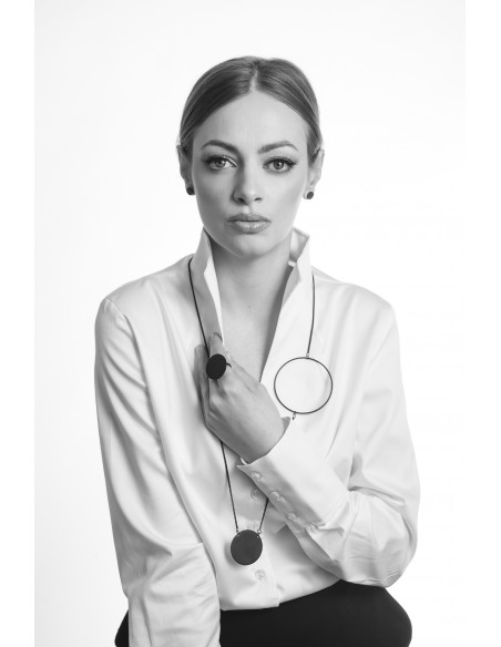 Black stainless steel earrings with polished center