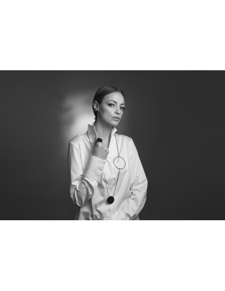 Black stainless steel earrings with polished center