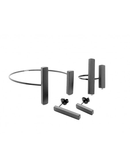A delicate and raw jewellery set made of black stainless steel