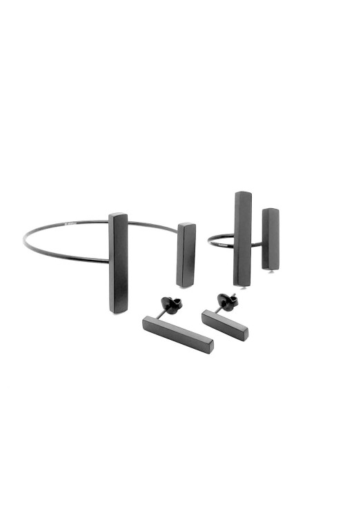 A delicate and raw jewellery set made of black stainless steel