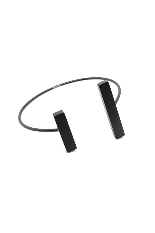 A delicate and raw jewellery set made of black stainless steel