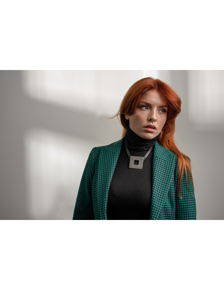 Leather necklace with large matte stainless steel element