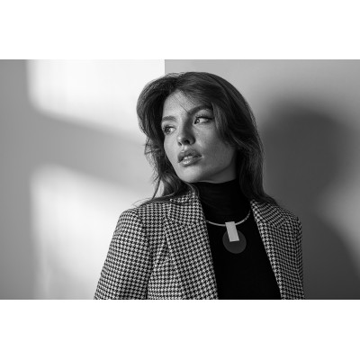 Stainless steel choker necklace with a decorative black and silver pendant 2