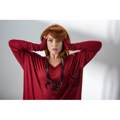 Long necklace made of black natural leather with matte black stainless steel circular elements. 2