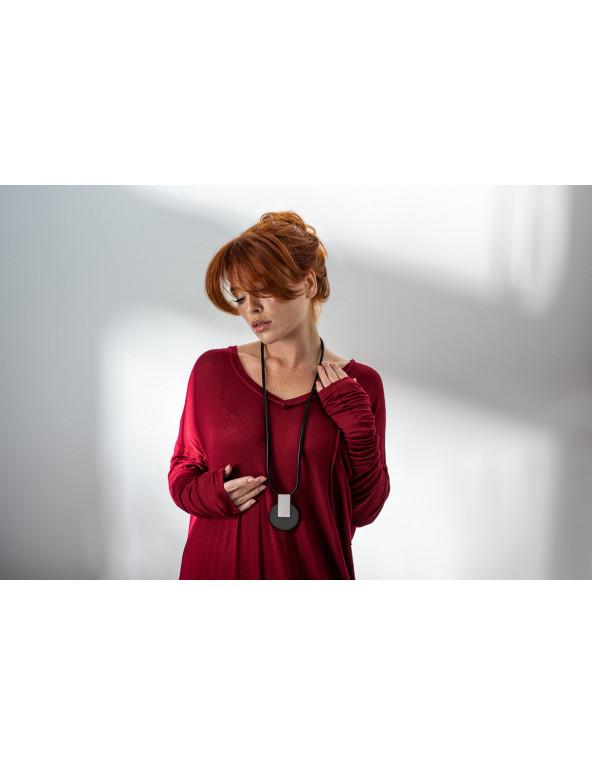 Long black leather necklace with decorative steel pendant