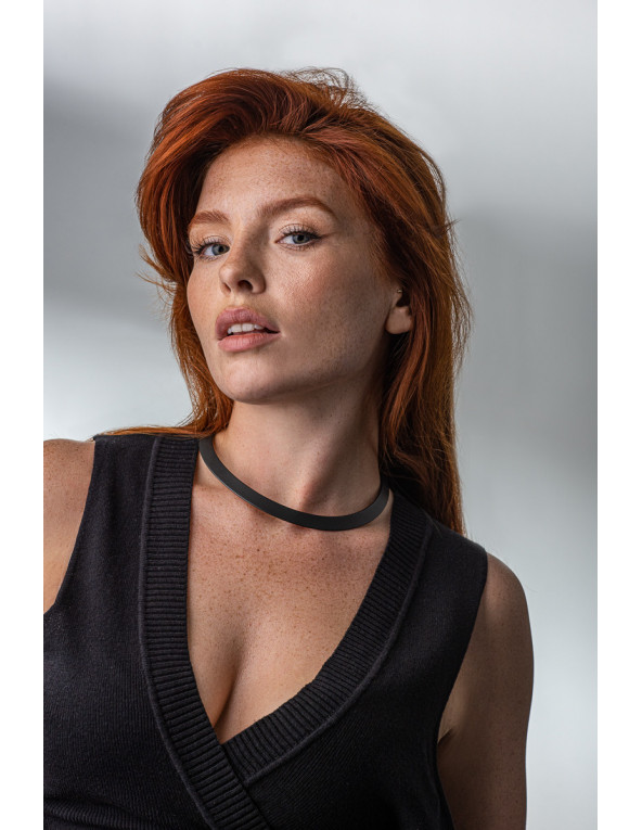 Black matte stainless steel choker on a white background
