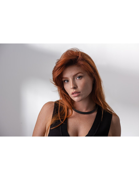 Black matte stainless steel choker on a white background