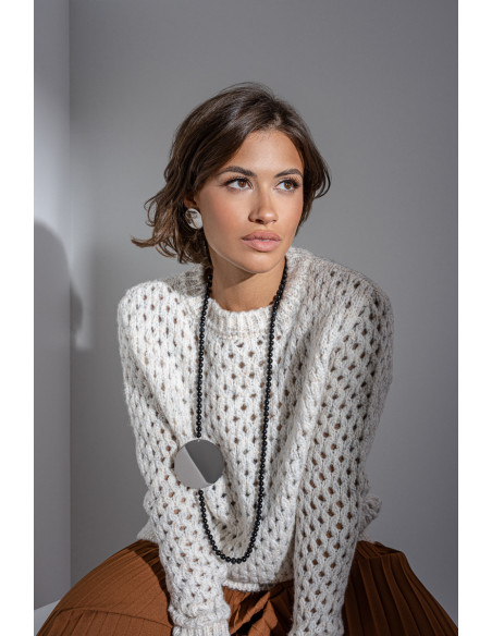 Long necklace of natural stones onyx with decorative circle