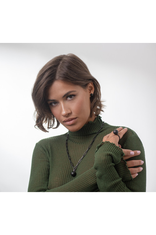 Delicate matte black stainless steel half-sphere stud earrings.