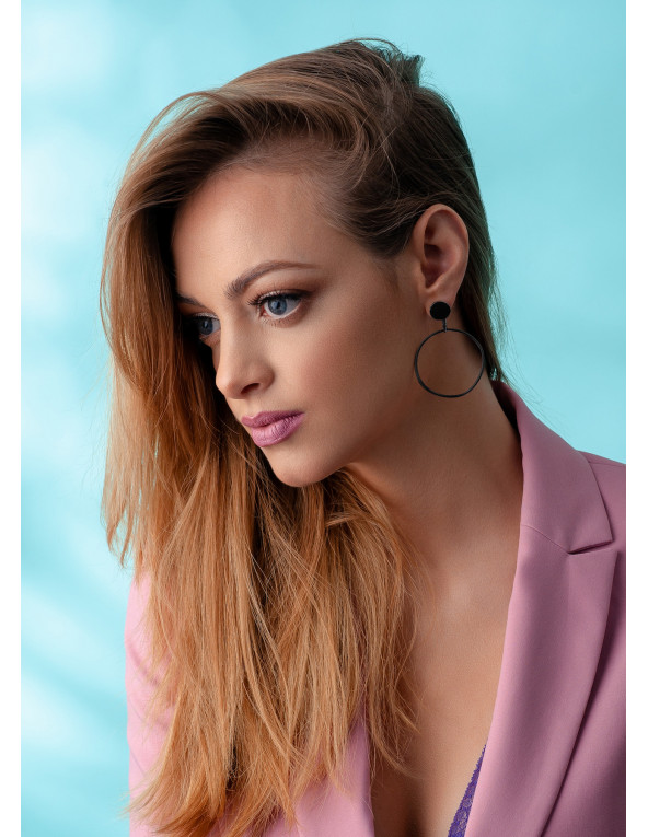 Black matte hoop earrings made of stainless steel.