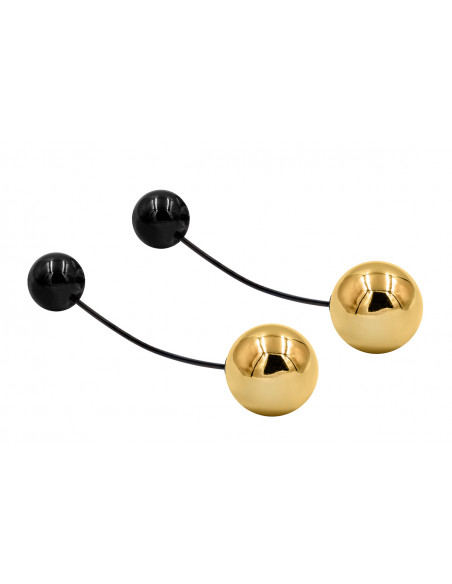 Gold-plated stainless steel earrings with black and gold spheres – elegant two-tone design.