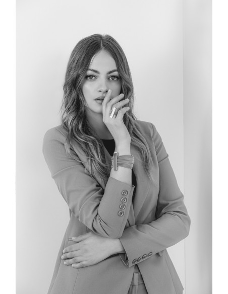 Bracelet made of wide stainless steel mesh and gold-plated steel with a magnetic clasp.