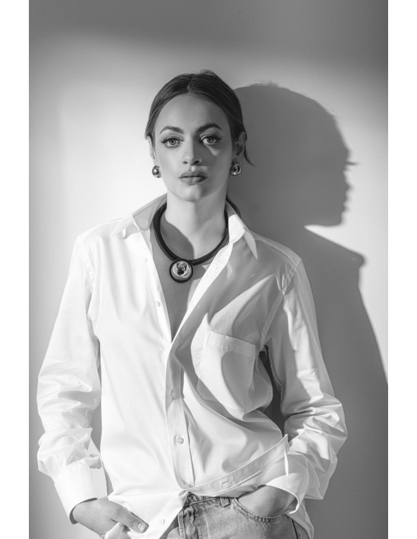 Black leather necklace with a shiny silver stainless steel pendant