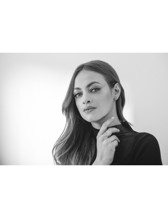 Delicate stainless steel hoop earrings on stud closure